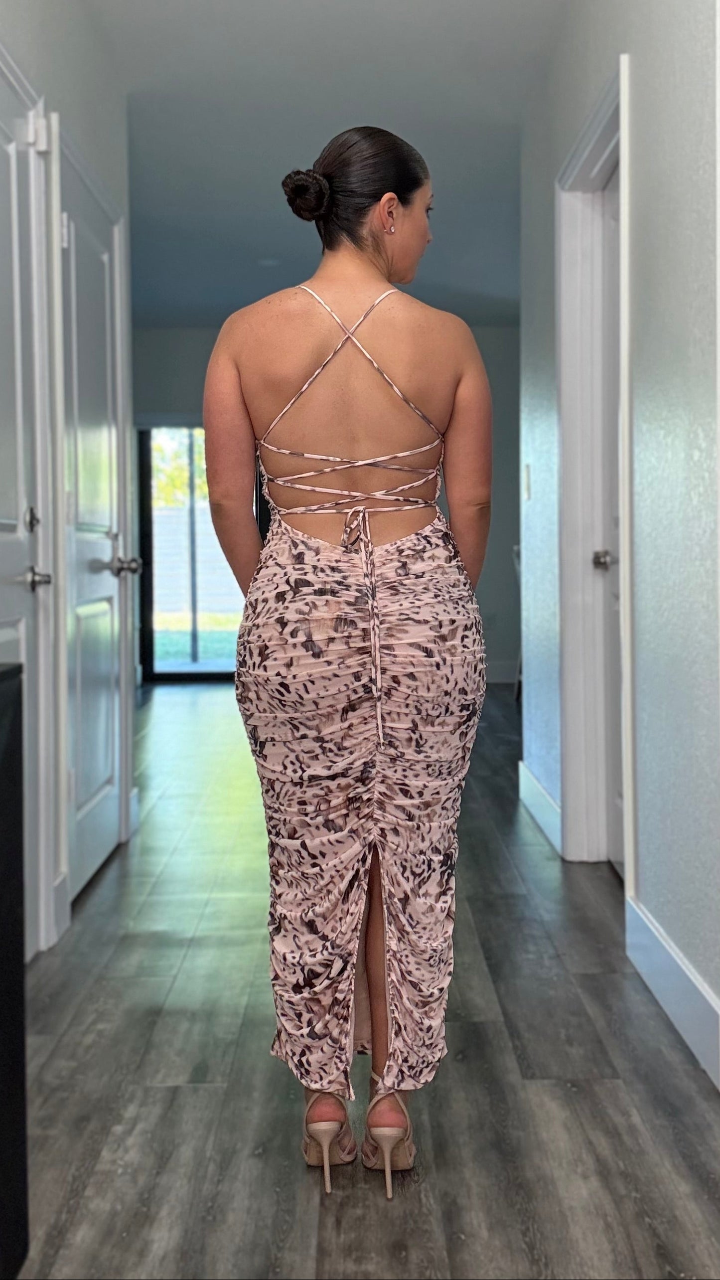 back of dress , multicolor with criss cross detail