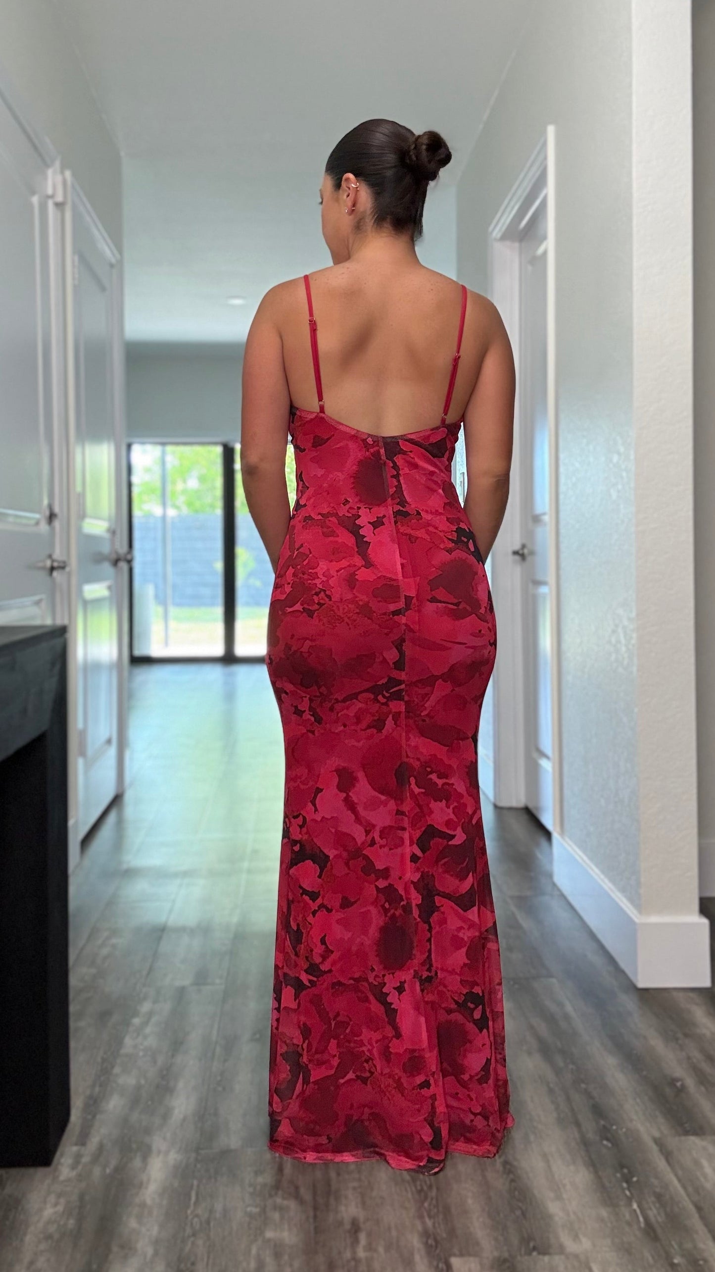 open back of red floral dress
