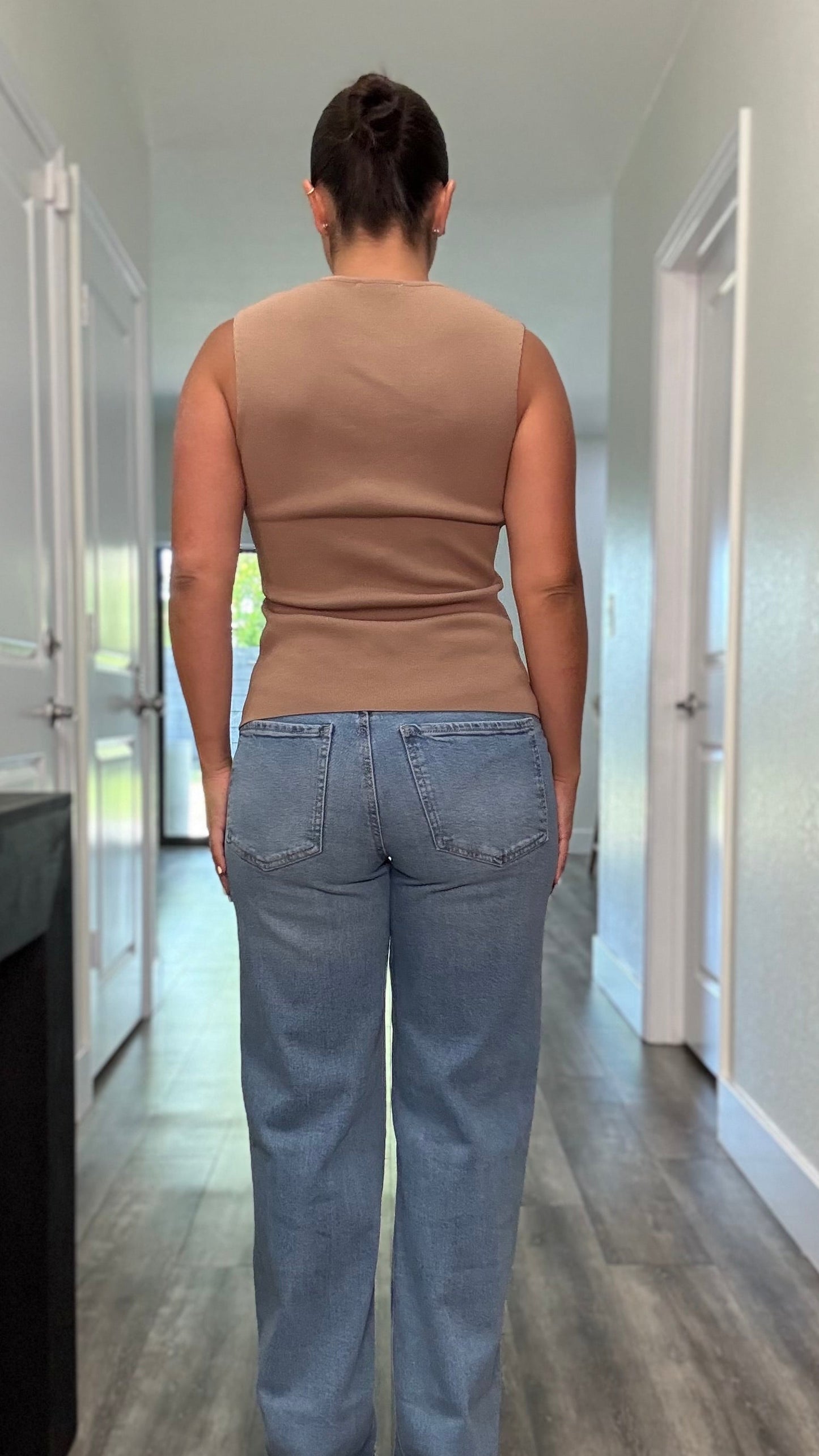 back side of tan colored shirt that is sleeveless