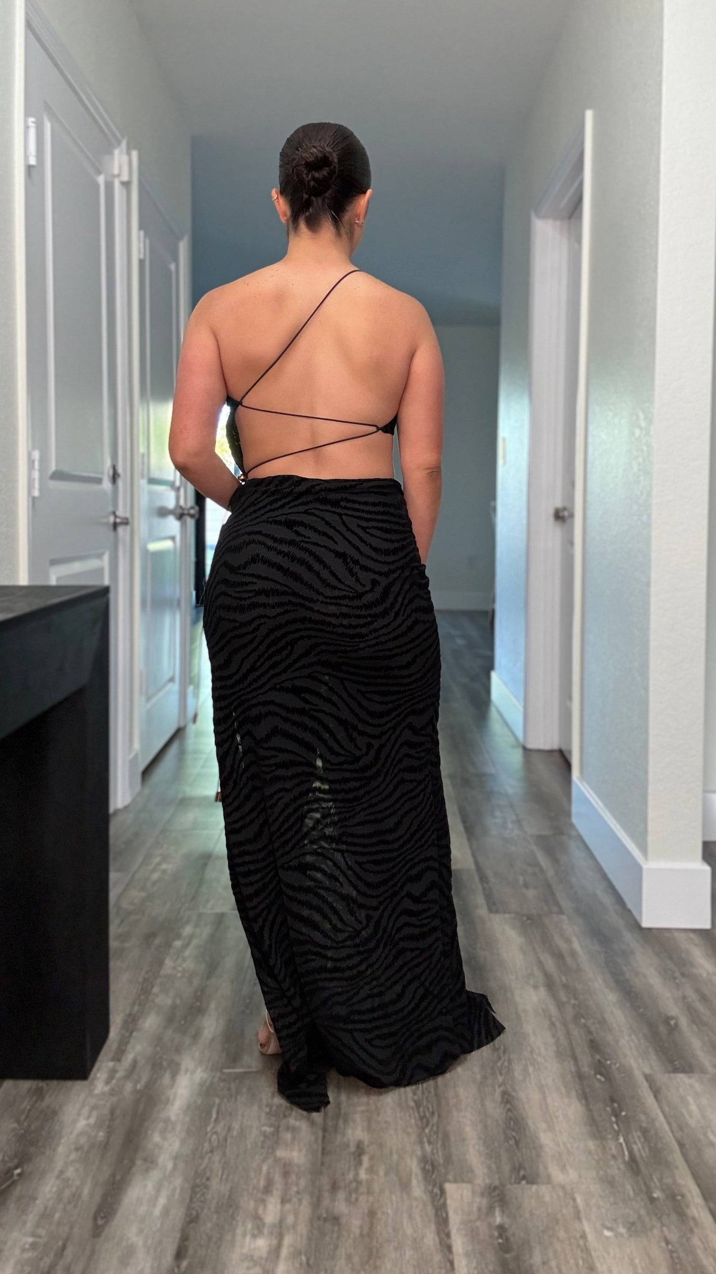 black velvet dress with asymmetrical criss-cross back