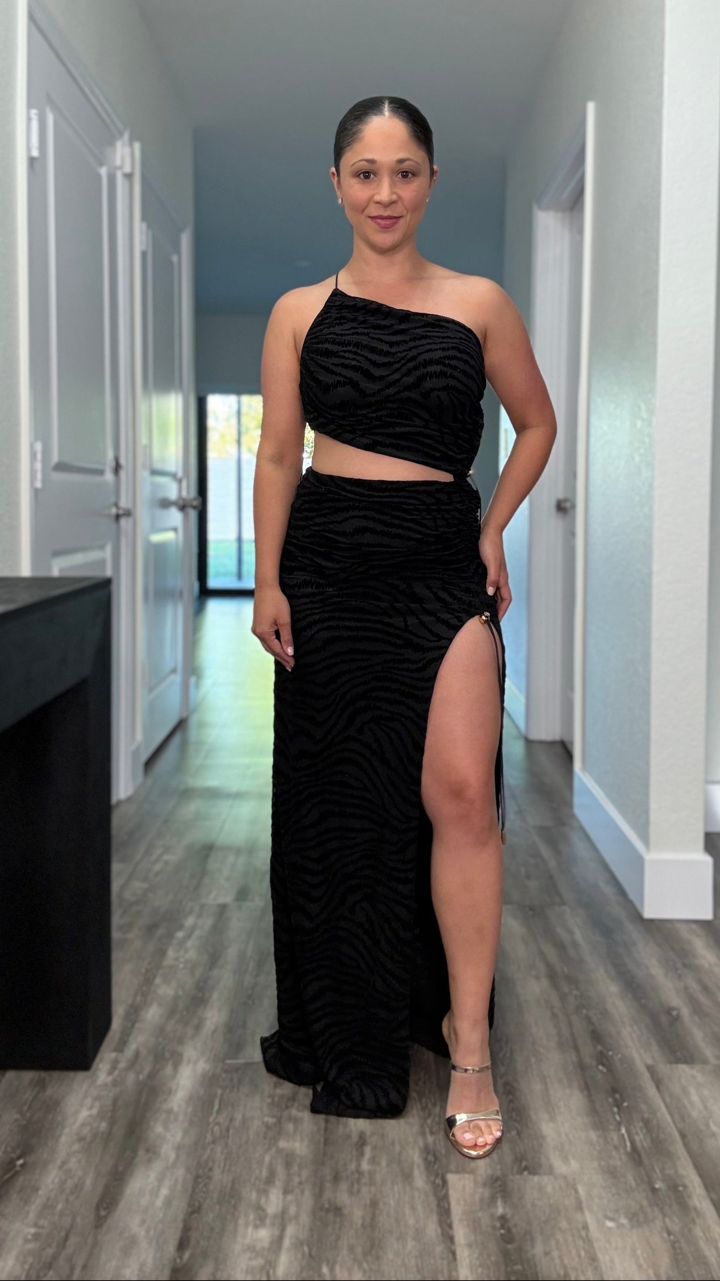 black velvet maxi dress with front cut out and thigh high adjustable slit