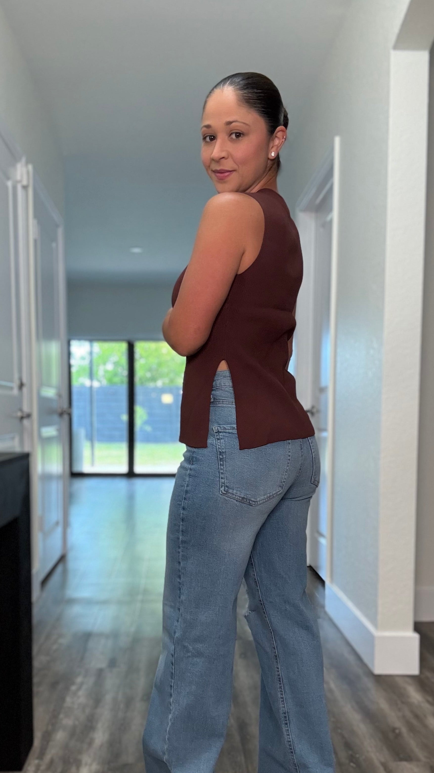 back of brown top with side slit detail