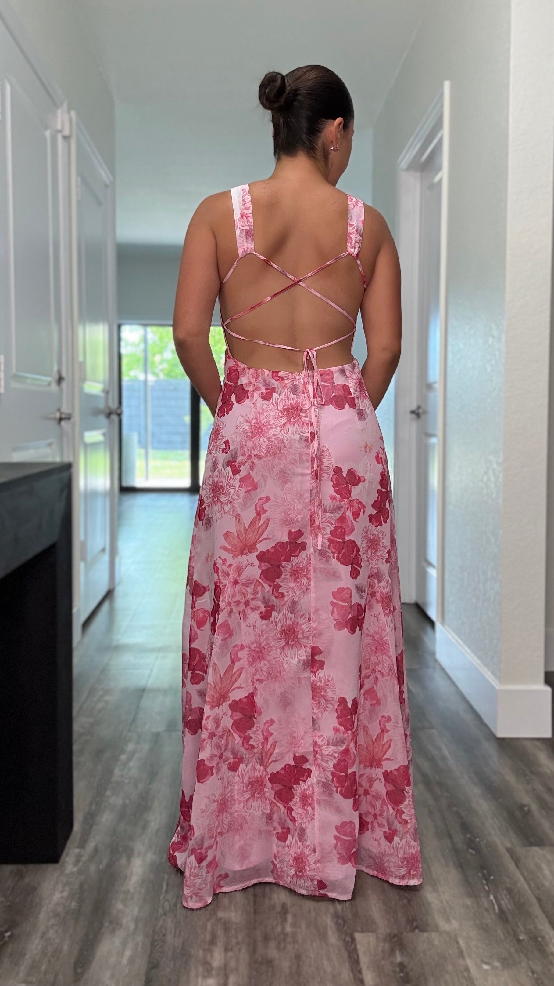 pink floral dress with back zipper closure and criss cross back tie