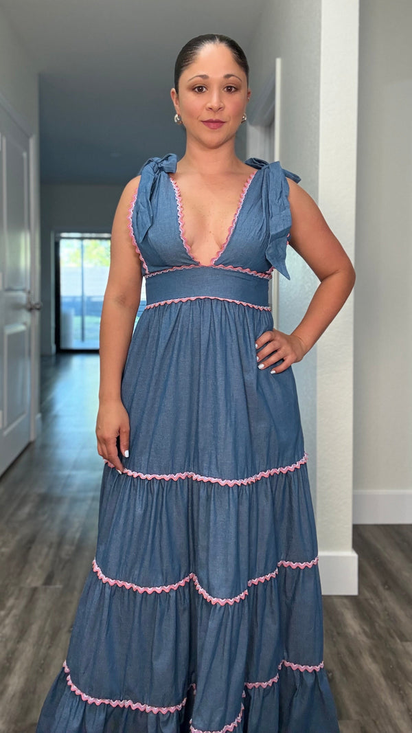 blue maxi dress with pink stripes and deep v plunge with shoulder ties