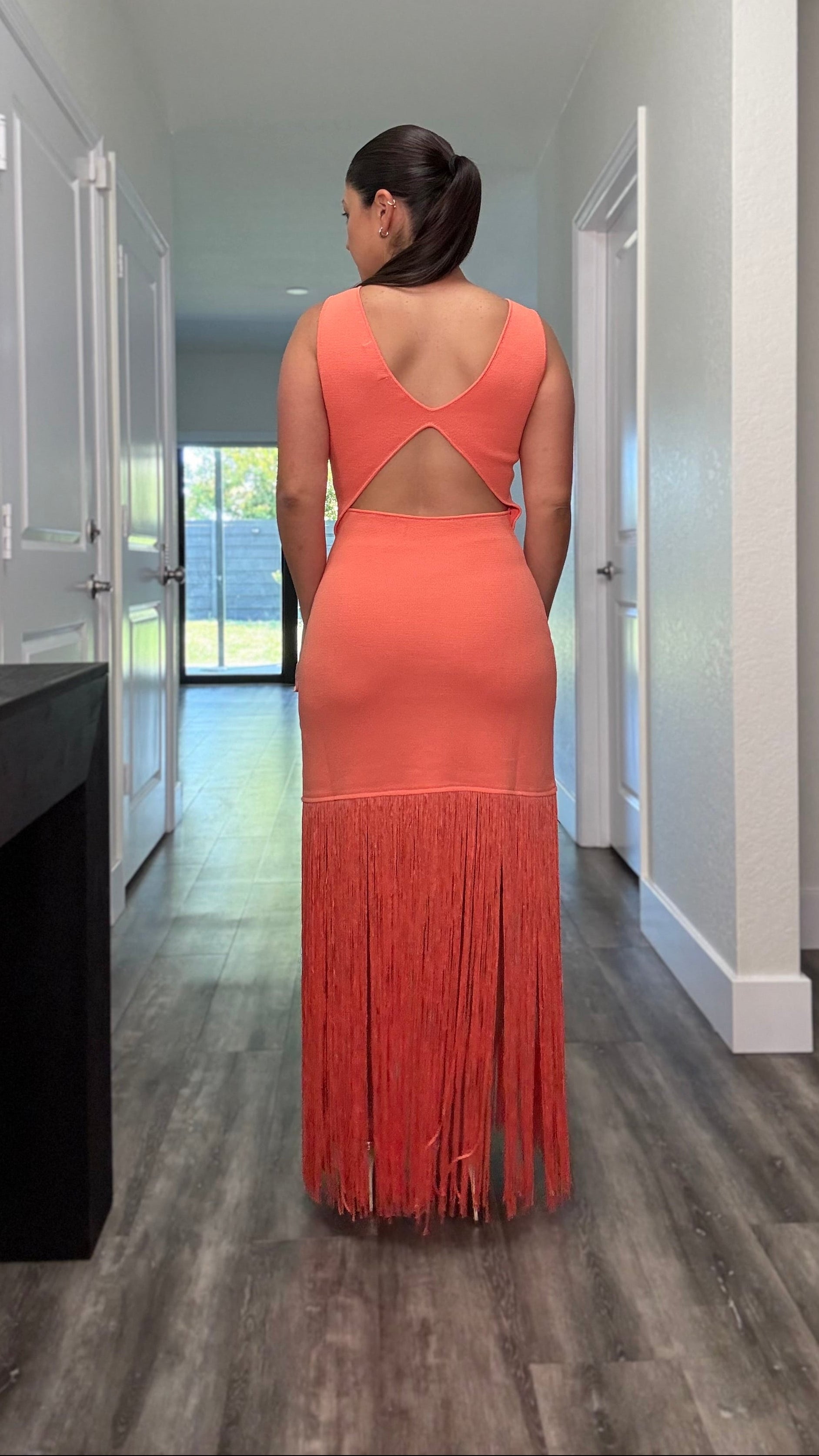 orange open back midi dress with fringe detail