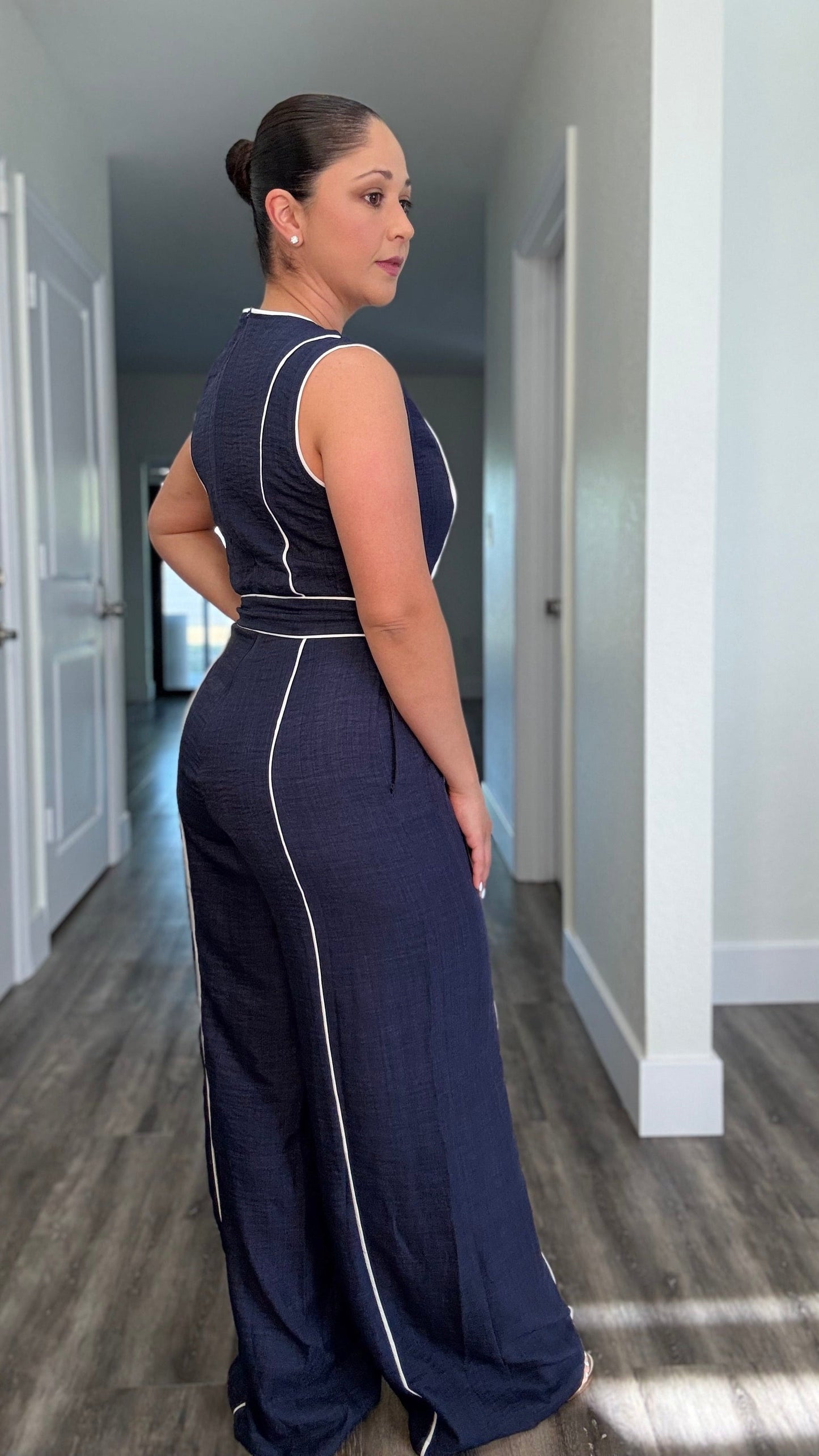 back of navy jumpsuit with waist tie