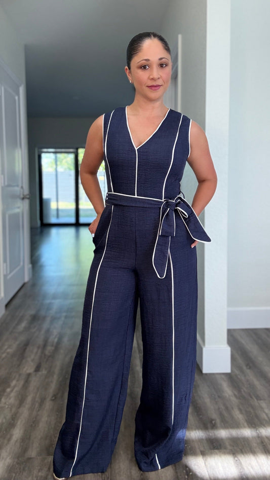front of navy jumpsuit with waist tie