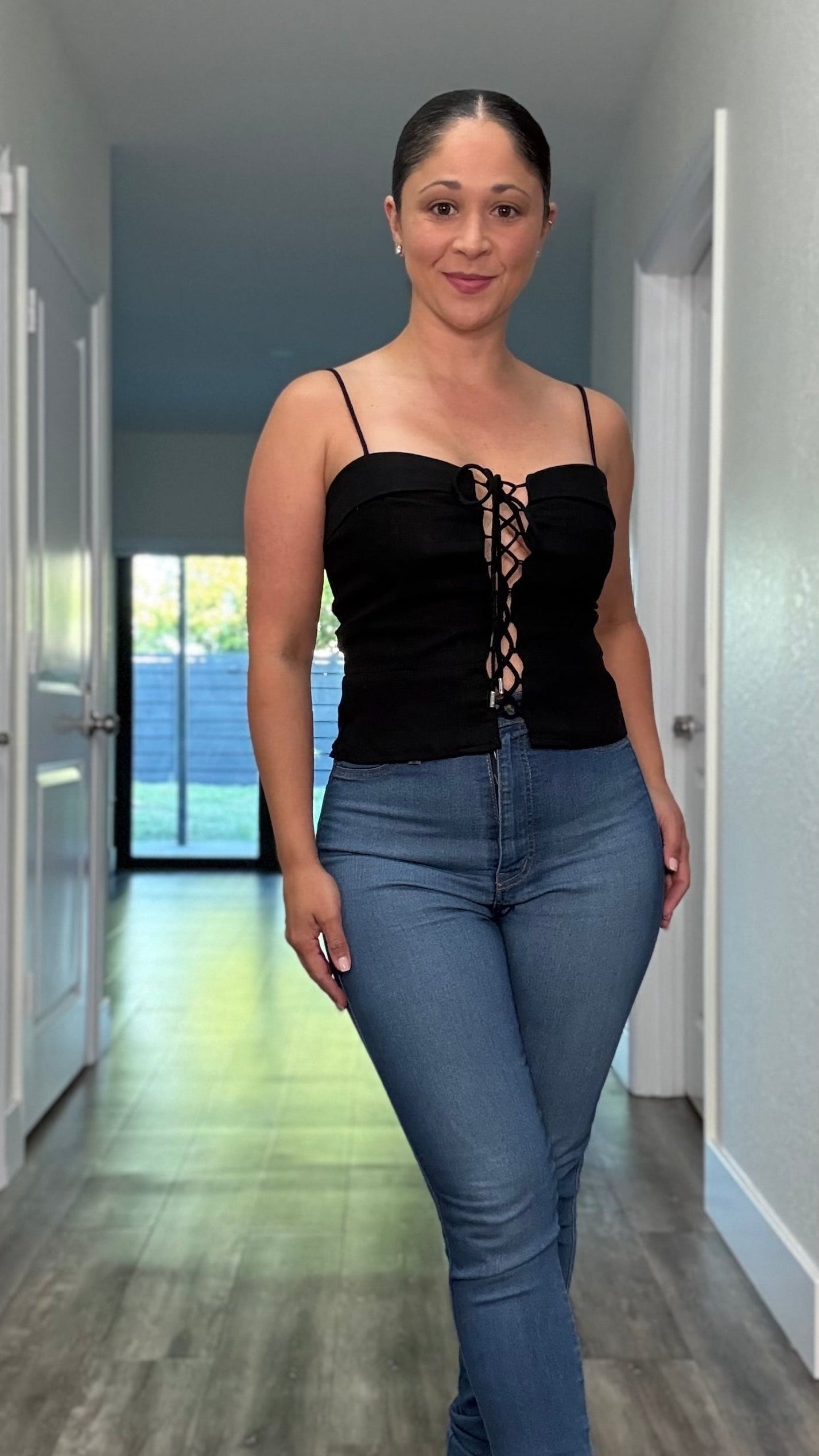 black spaghetti strap top with front lace up detail closure